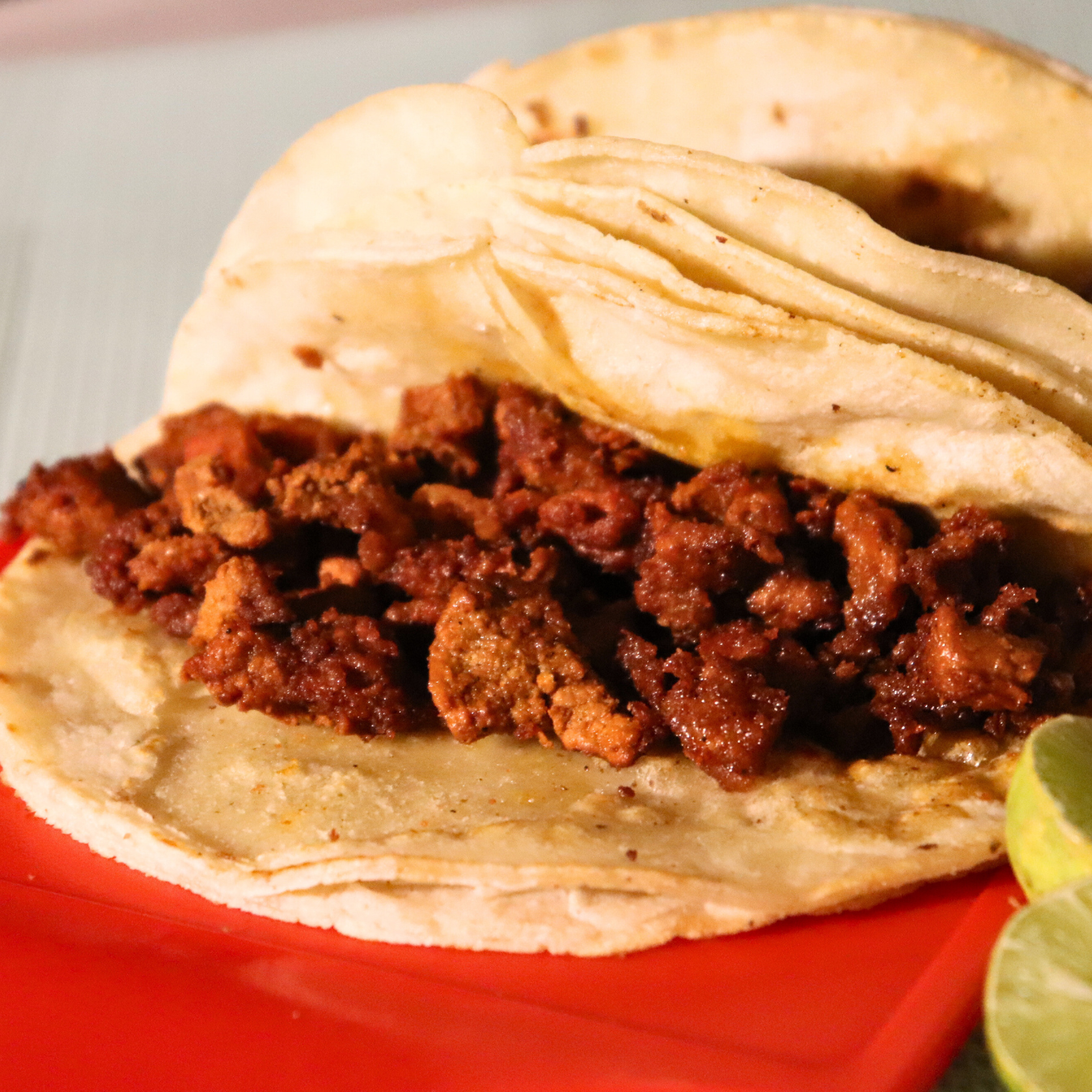 Taco de adobada Tacos El Pariente