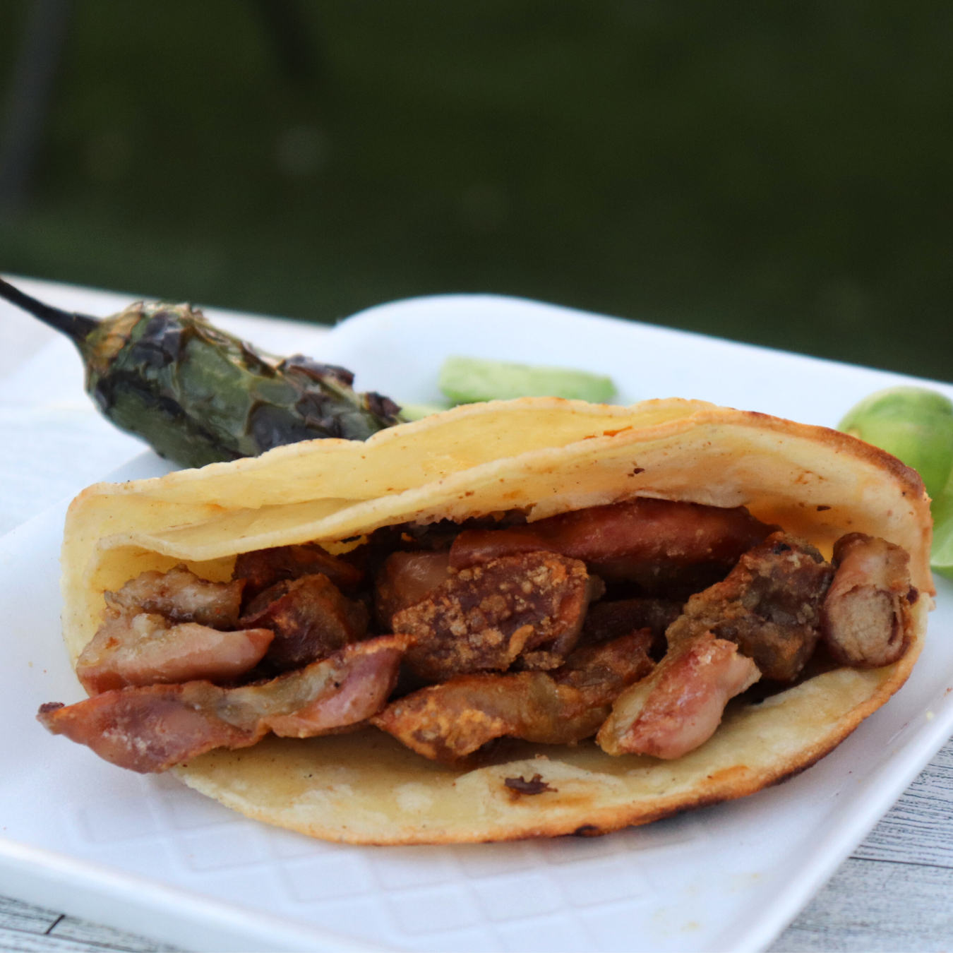 Taco de tripitas Tacos El Pariente